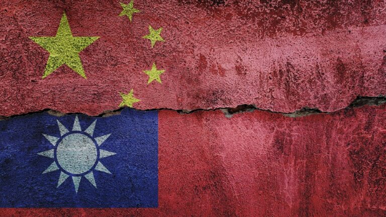 China and Taiwan flag on cracked wall background. Economics, politics conflicts, war concept texture background