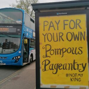 Unauthorized anti-Coronation poster in a bus stop ad space in Norwich by Specialpatrols