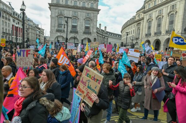 London, UK-February 01 2023: Tens of thousands of striking teachers, civil servants, train drivers and other workers demonstrate and rally demanding a pay rise and against the strike bill.