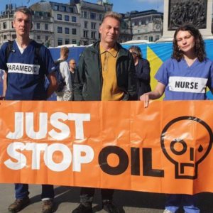demonstrators from Just Stop Oil with a banner