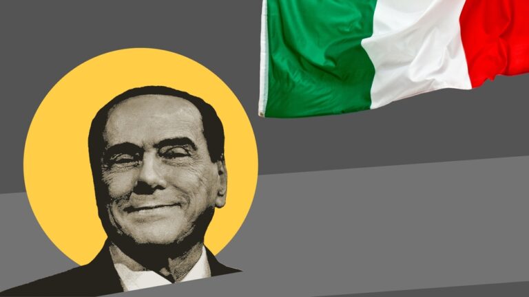 Milan, Italy - June 12, 2023: A black and white poster of former Italian Prime Minister Silvio Berlusconi with a waving Italian flag. Berlusconi died on June 12, 2023, at the age of 85.