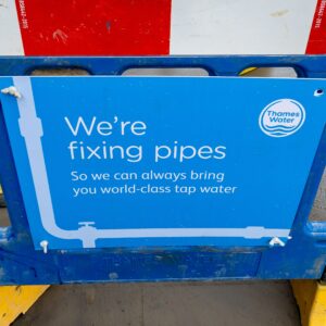 London. UK- 02.04.2023. A notice on the street by Thames Water informing pedestrian of work repairing water pipes.
