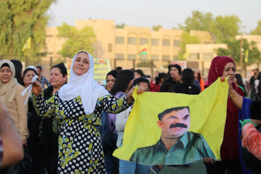 A Kurdish woman dancing at a celebration of the revolution in Qamishli, 2023. Photo by Anna Rebrii.