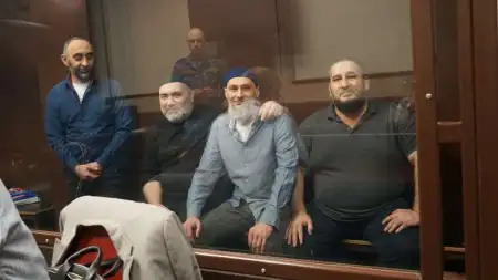 Crimean political prisoners, victimised for supporting other victims of repression, in court, November 2023. From left, Rustem Taiirov, Dzebbar Bekirov, Ruslan Murasov and Zavur Abdullayev. Photo: Crimean Solidarity