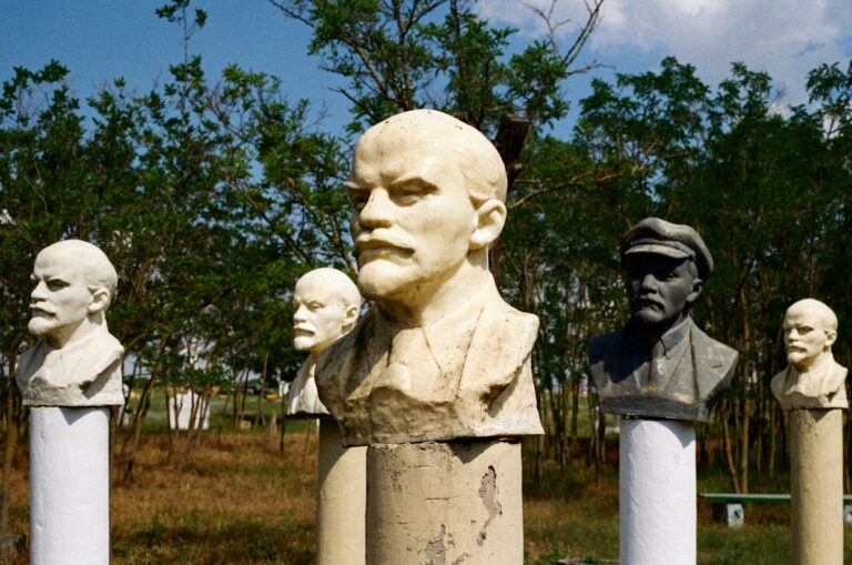 Concrete statues of Lenin's head.