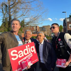 Image of Sadiq Khan having a selfie taken while out canvassing.