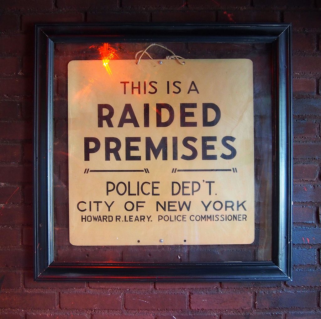 The "raided premises" sign just inside the door at the Stonewall Inn.