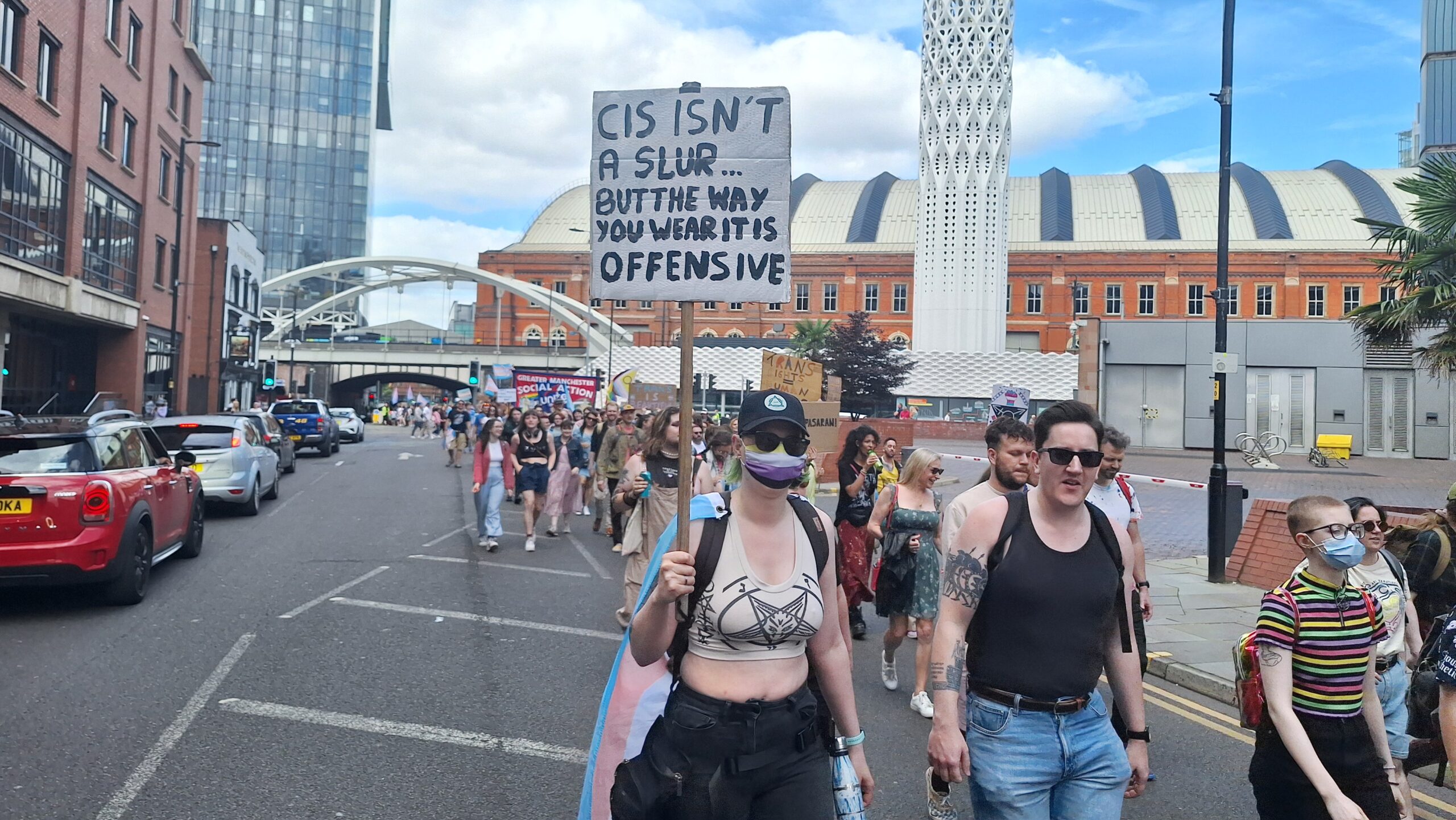 Cis critique placard at Manchester Trans Pride