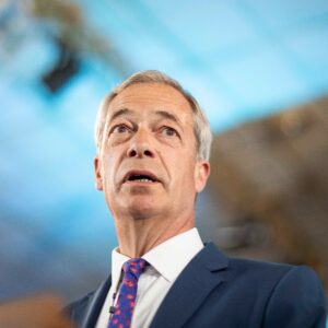 Picture of Nigek Farage with blue and black background