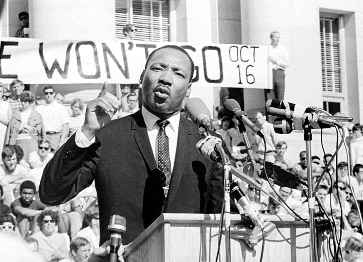 martin Luther King speaking at a big rally