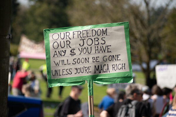 Hand made sign from Washington protest April 5: Our freedom, our jobs what mony you have, unless you are maga rich