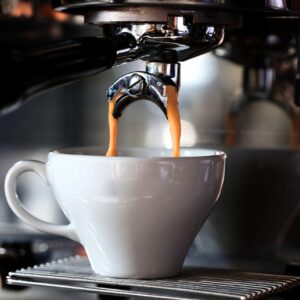 Coffee pouring into a cup