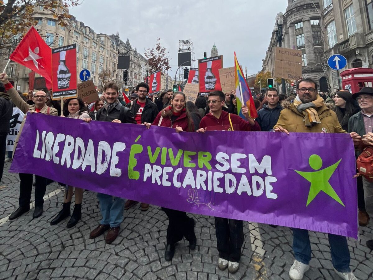 demonstrators with banner during general strike