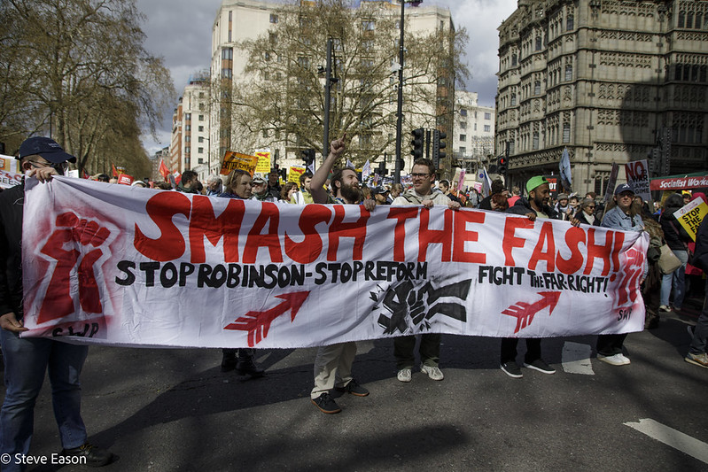 Banner stating Smash the Fash at Together Alliance demo in London