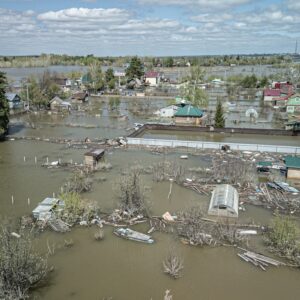 Floods and cyclones result from global warming. Shutterststock