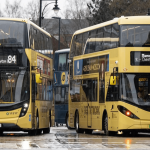 Two yellow buses from Greater Manchesters Bee network