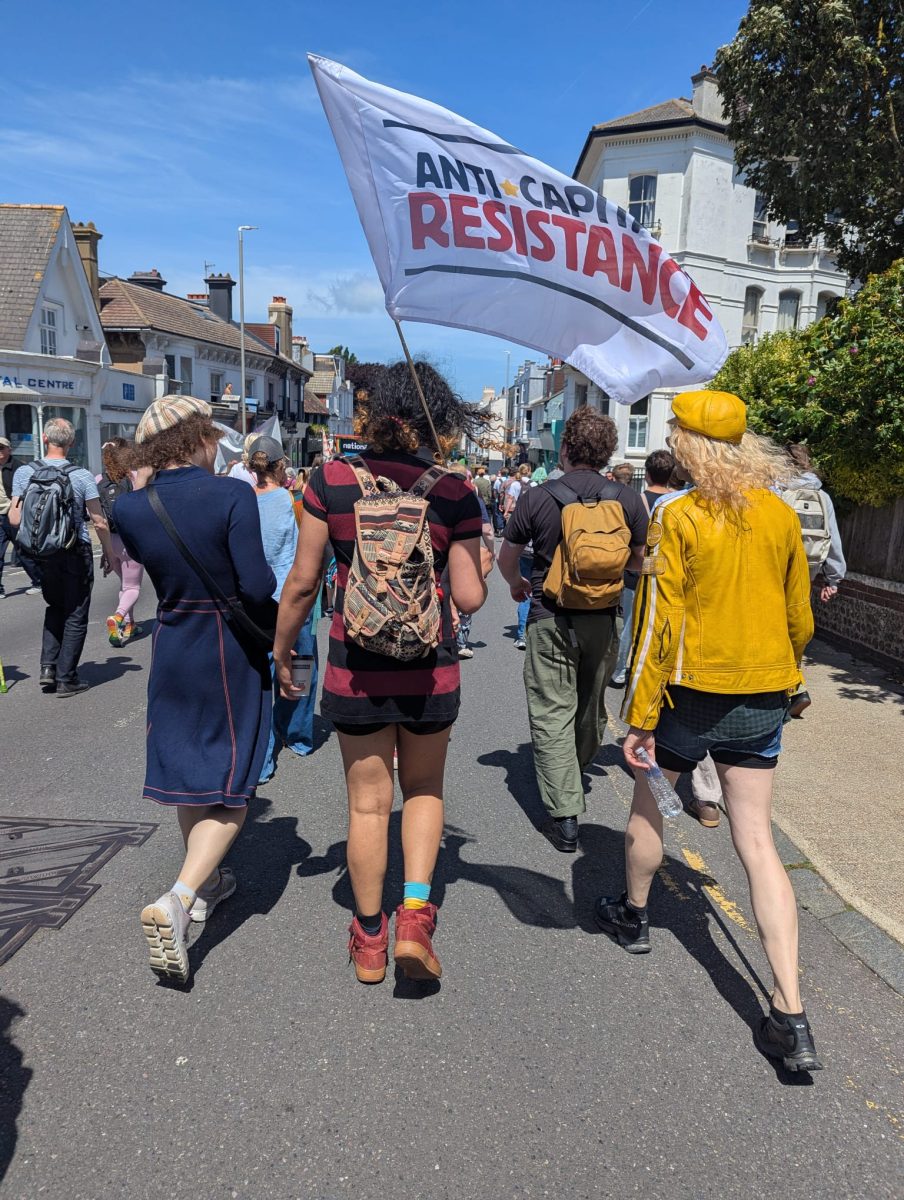 Carrying an ACR flag on Brigton Carnival v Fascism. Photo: Dora  Pitura