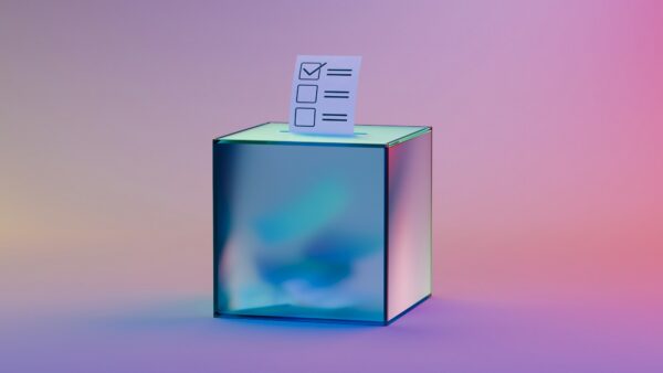 Silver box with ballot paper sticking ouy