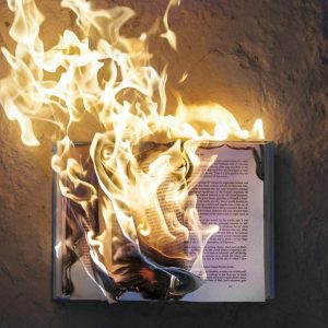 book being burnt symbolising censorship