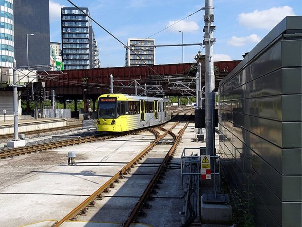 creatve common picture of manchester tram leaving victoria sation John Lucas