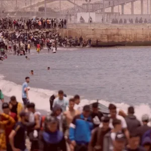 migrants from Morocco in Ceuta attempting to cross to Europe