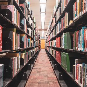Photo of long stacks of books in library Zetong Li Pexels