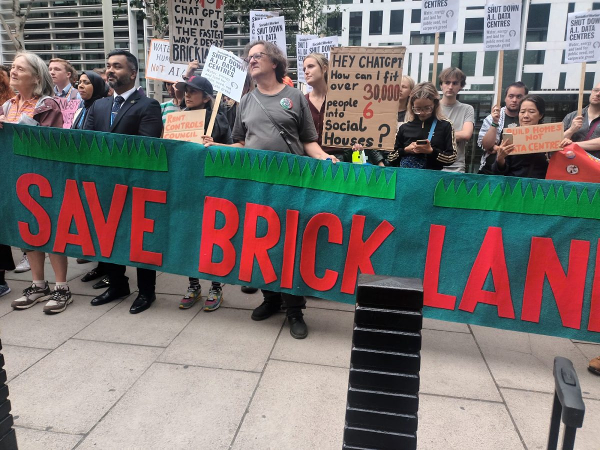 Large banner saying Save Brick Lane